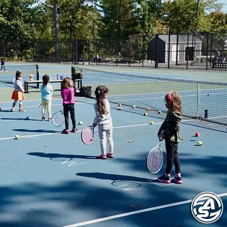 Girls playing tennis