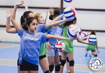 Girls playing volleyball